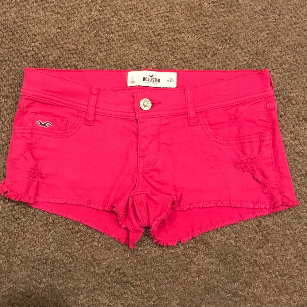 Pink distressed shorts